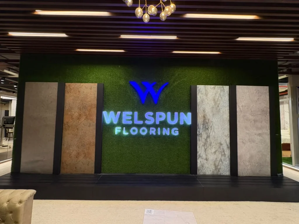 MARK Events & Exhibitions | #1 Event Management Company in Hyderabad 14 Welspun Flooring branded display wall with backlit signage by MARK Events
